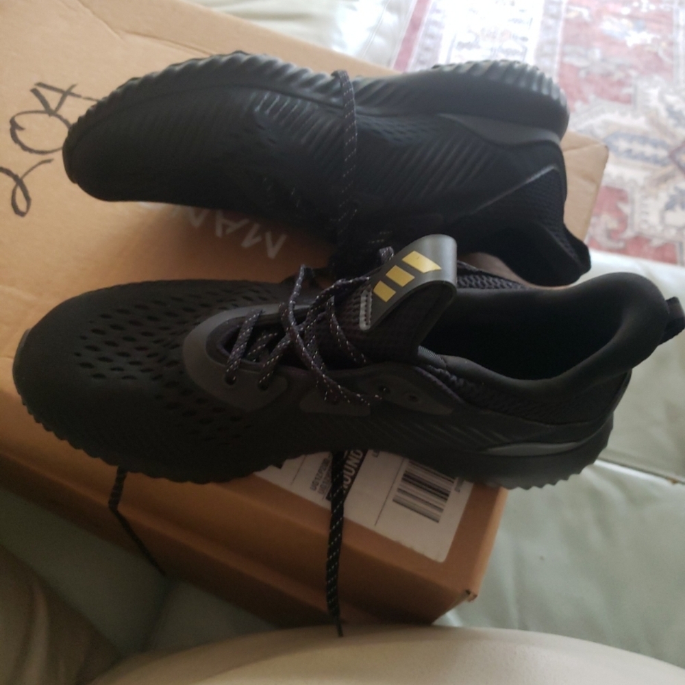 Adidas Men's Black Sneakers with Gold Accents